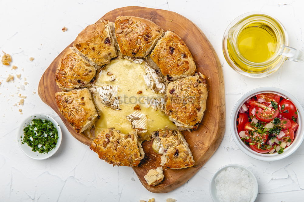 Similar – Image, Stock Photo Baguette with olives, garlic and cheese