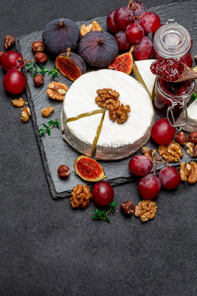 Similar – Image, Stock Photo Camembert cheese and berries