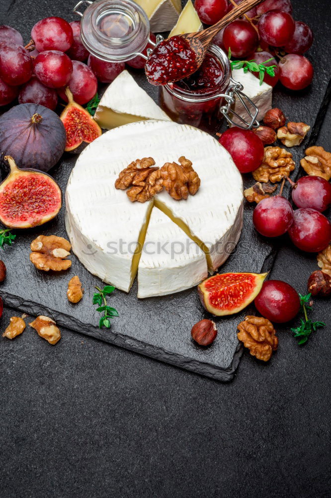 Similar – Image, Stock Photo Flammkuchen with grapes and sheep cheese bake