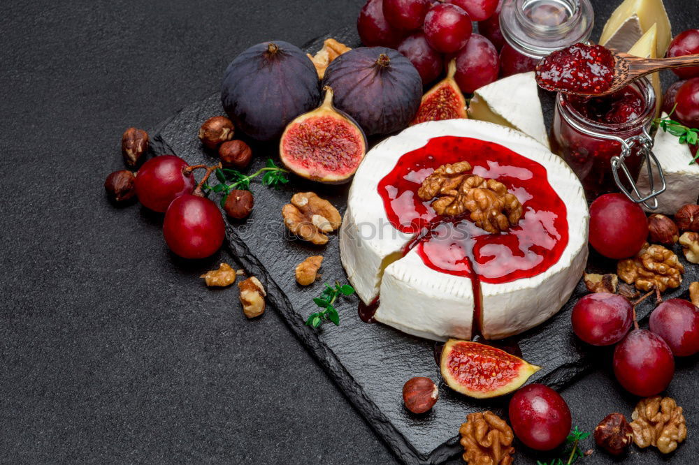 Similar – Image, Stock Photo Camembert cheese and berries