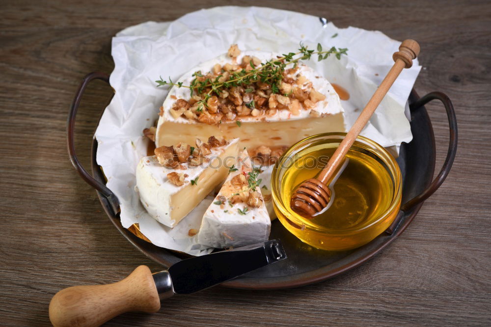 Similar – Image, Stock Photo Handmade ricotta cheese on a rustic kitchen table