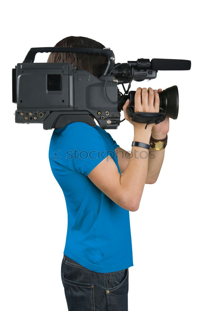 Similar – Image, Stock Photo Young photographer playing with accessories for professional camera like with rifle while lying on floor