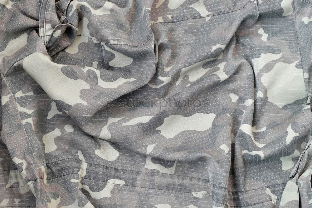 Similar – camouflage Camouflage