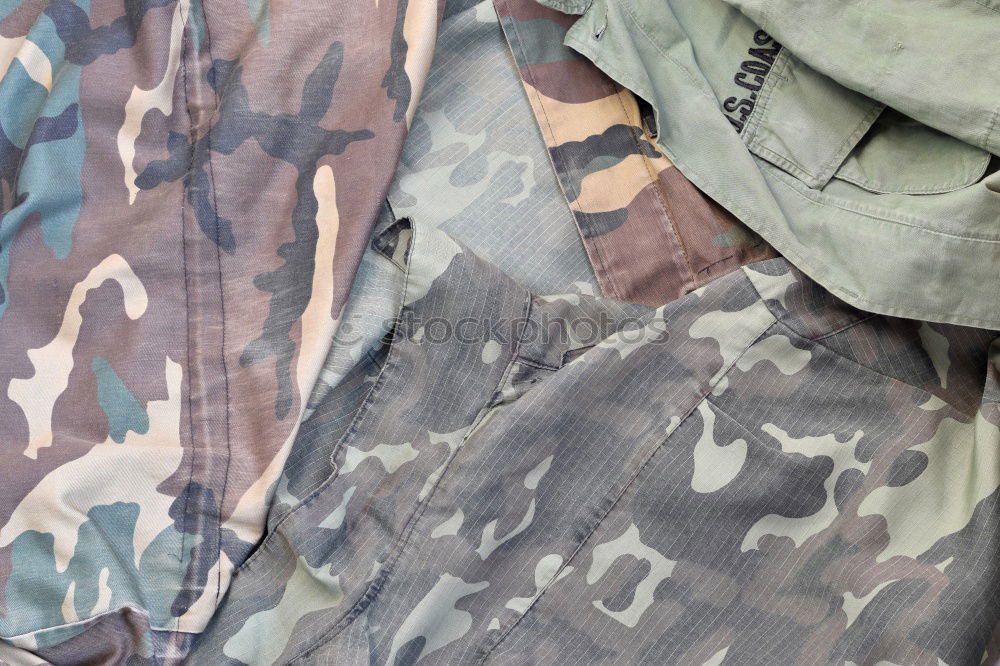 Similar – camouflage Camouflage