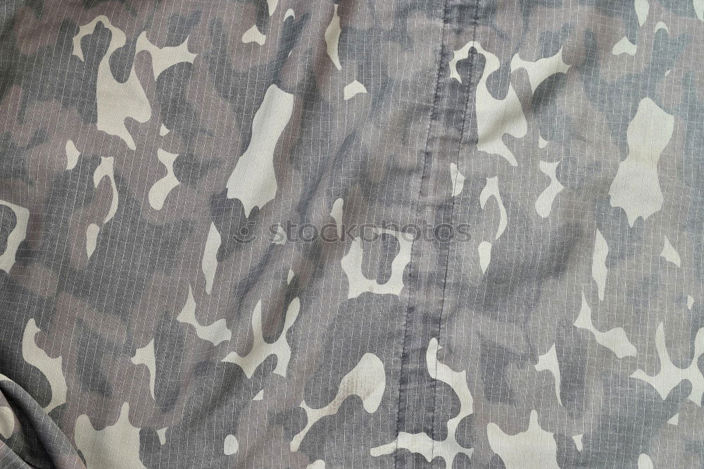 Similar – camouflage Camouflage