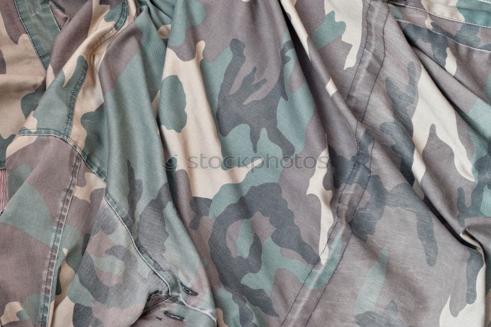 Similar – camouflage Camouflage