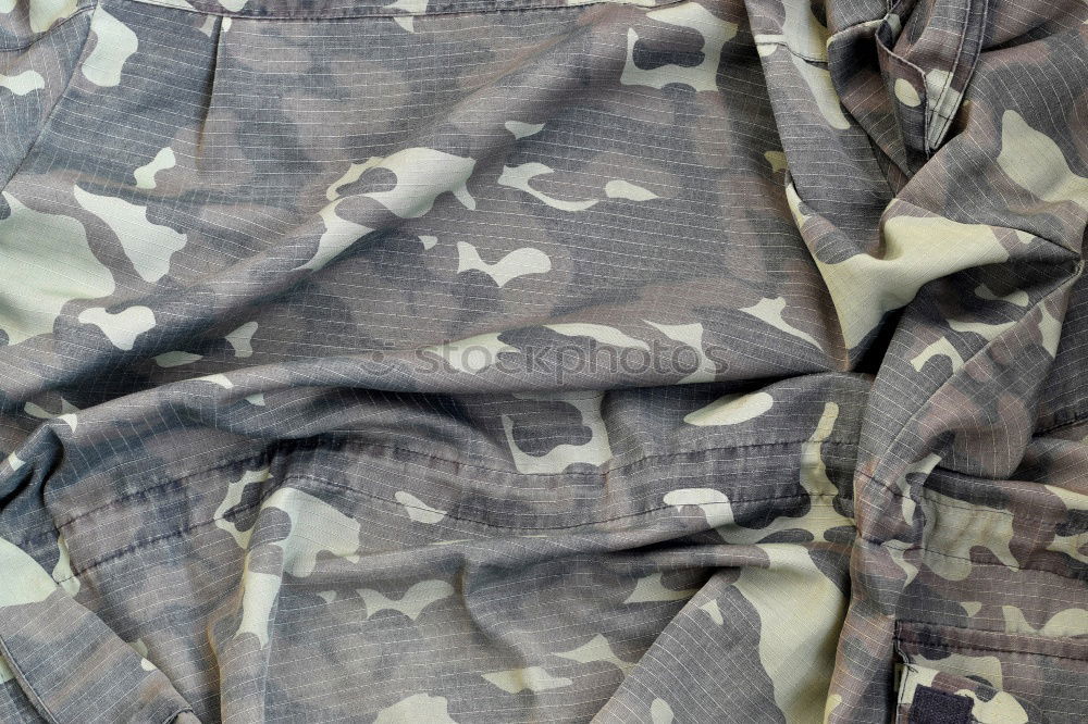 Similar – camouflage Camouflage