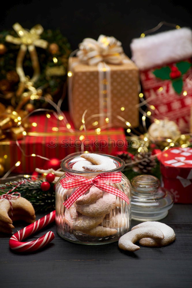 Similar – Image, Stock Photo Christmas parcel with red bow on wooden background.