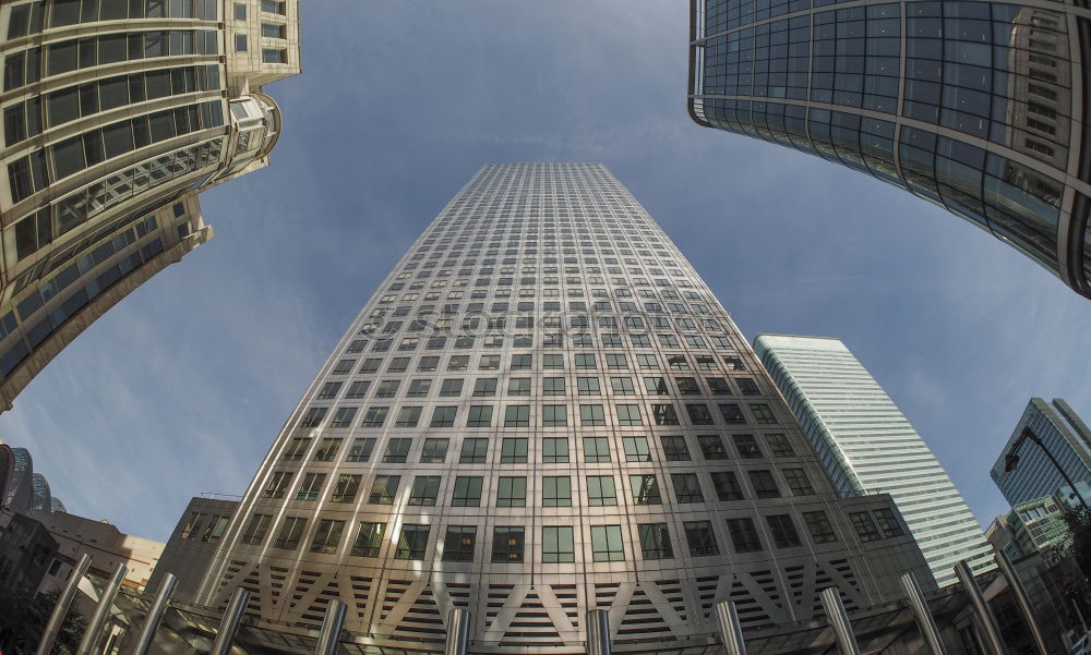 Similar – Man climbing the stairs to the skyscraper