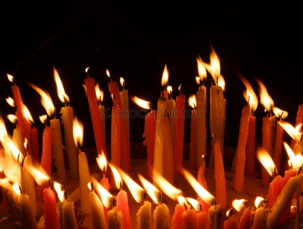 Similar – long lighted candles group in orthodox church. candles background. selective focus