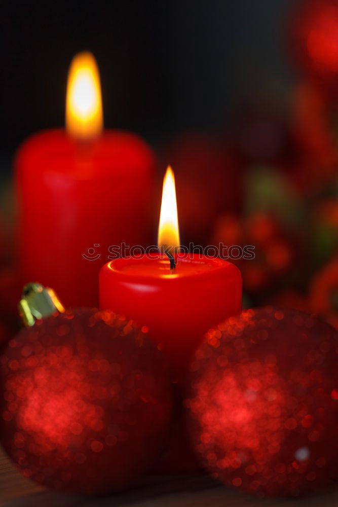 Similar – Christmas Advent wreath with 4 burning candles on old wood