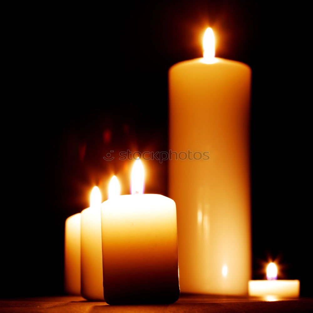 Similar – Image, Stock Photo A match lights the fire of many candles