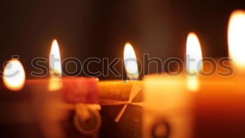 Similar – long lighted candles group in orthodox church. candles background. selective focus