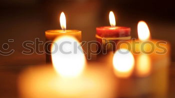 Similar – Colorful tea lights shine for birthday