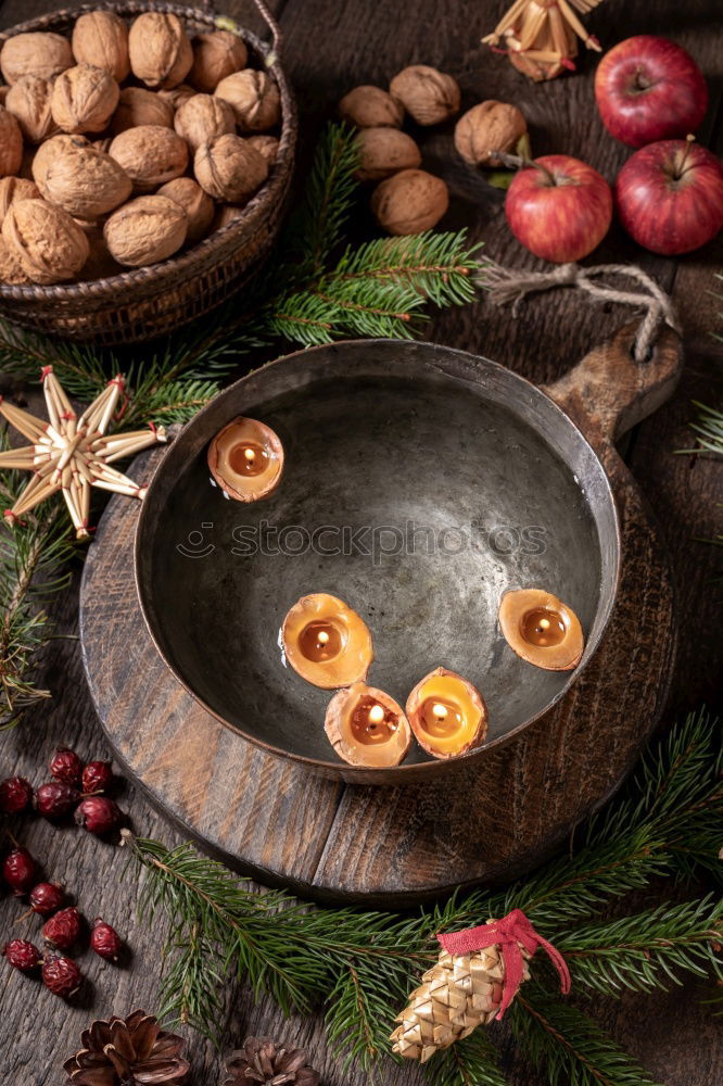 Similar – Mulled wine with spices, cookies and gingerbread man