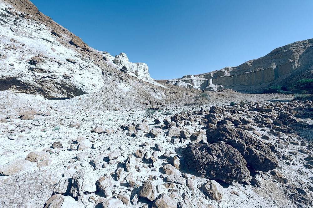 Similar – Image, Stock Photo Traveler on top of rocky mountain edge