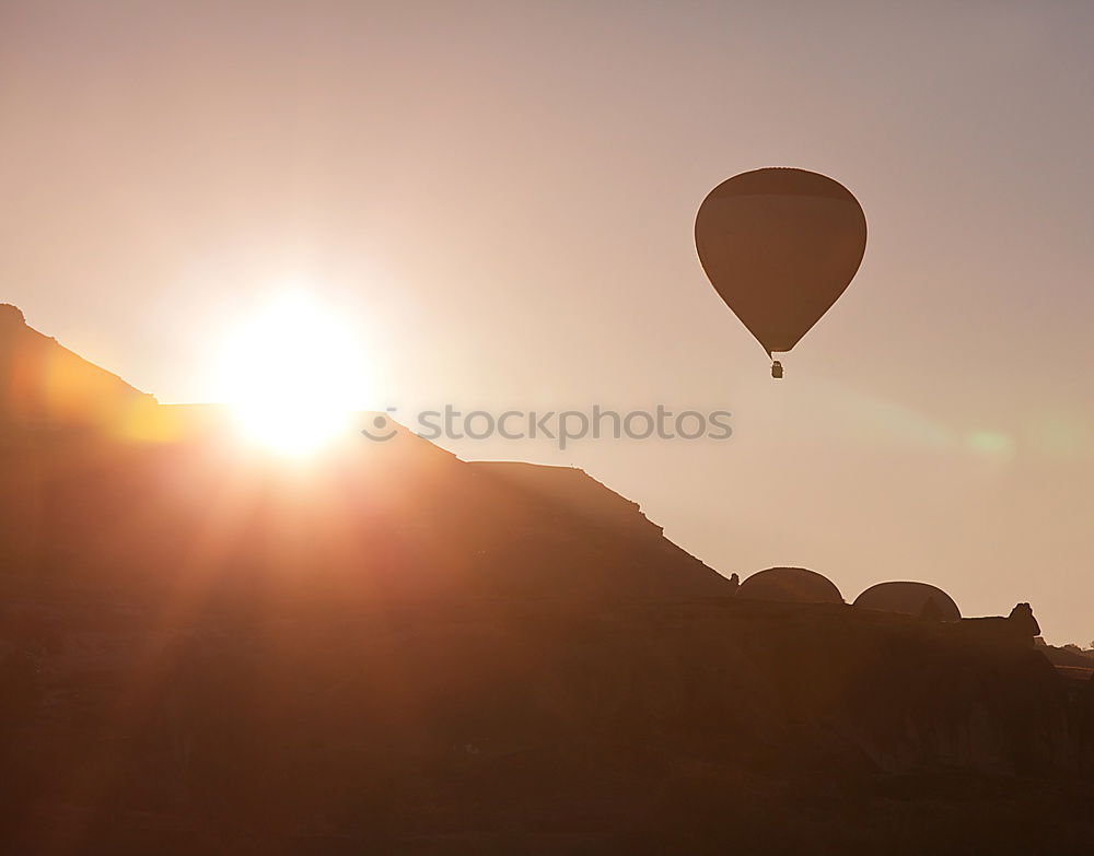 Similar – Image, Stock Photo Paragliding in the sunset at the sea