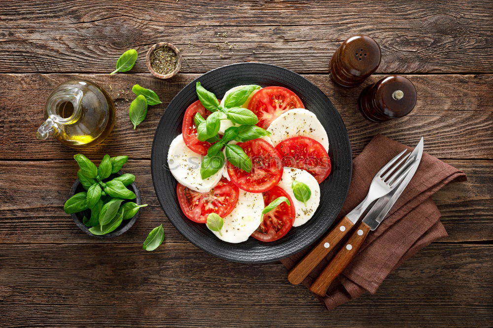 Similar – Raw italian pasta, basil and vegetables