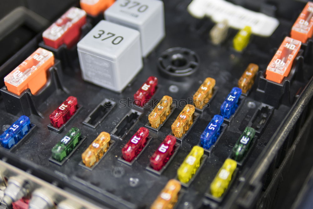 Similar – Relay and fuse box inside car