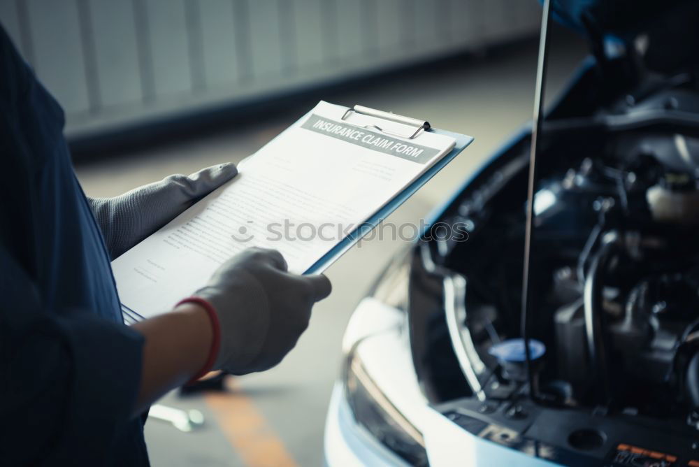 Similar – Image, Stock Photo Mechanic repairing customized motorcycle