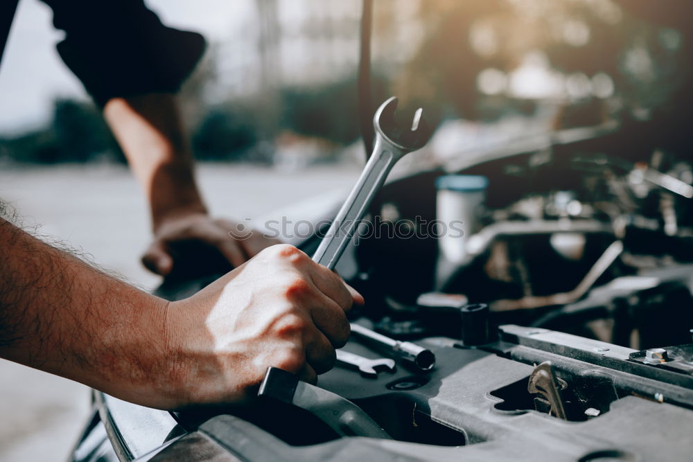 Man putting part on bike