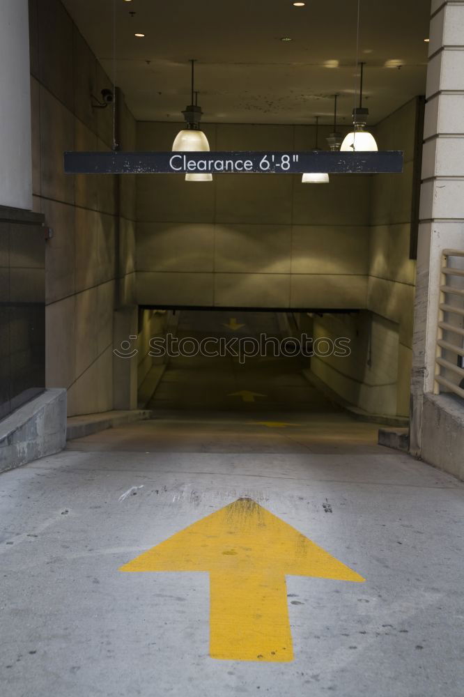 Similar – Tiefgarage von innen. Ausfahrt Schild. Parkmarkierungrn, leerer Einkaufswagen. Neonröhren,. Dreckig und hässlich