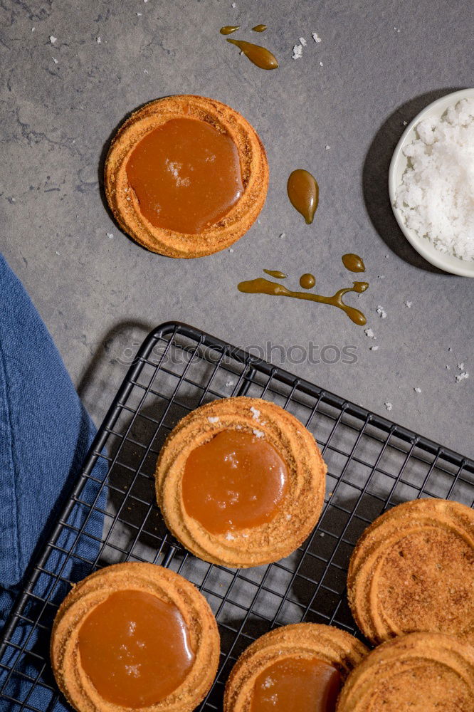 Similar – Image, Stock Photo Woman hands cutting a pumpkin pie. Purple background.