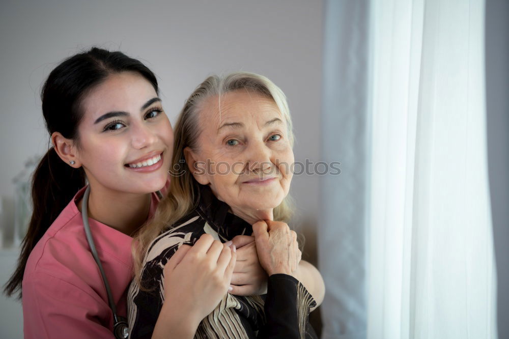 Similar – Image, Stock Photo Female caretaker posing with elderly patient