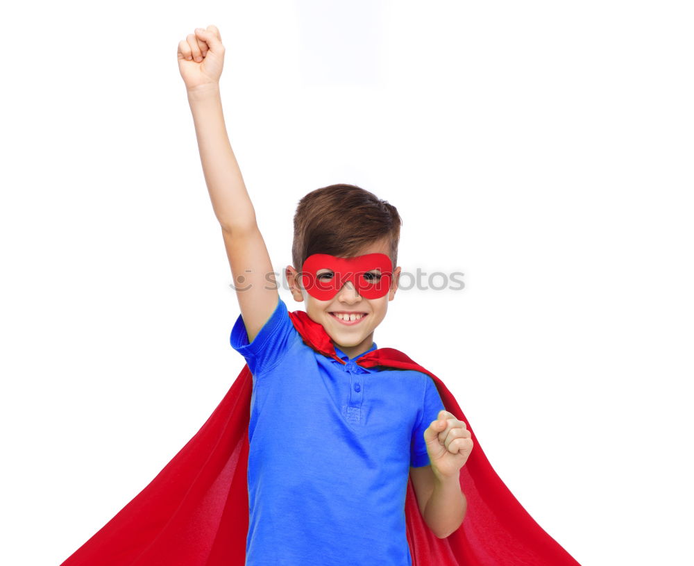 Similar – Happy little child playing superhero. Kid having fun outdoors. Concept of girl power.