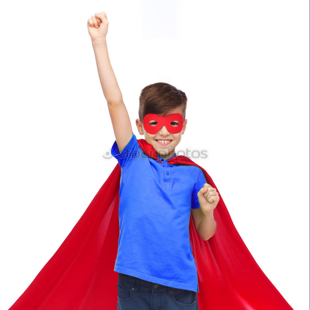 Similar – Happy little child playing superhero. Kid having fun outdoors. Concept of girl power.