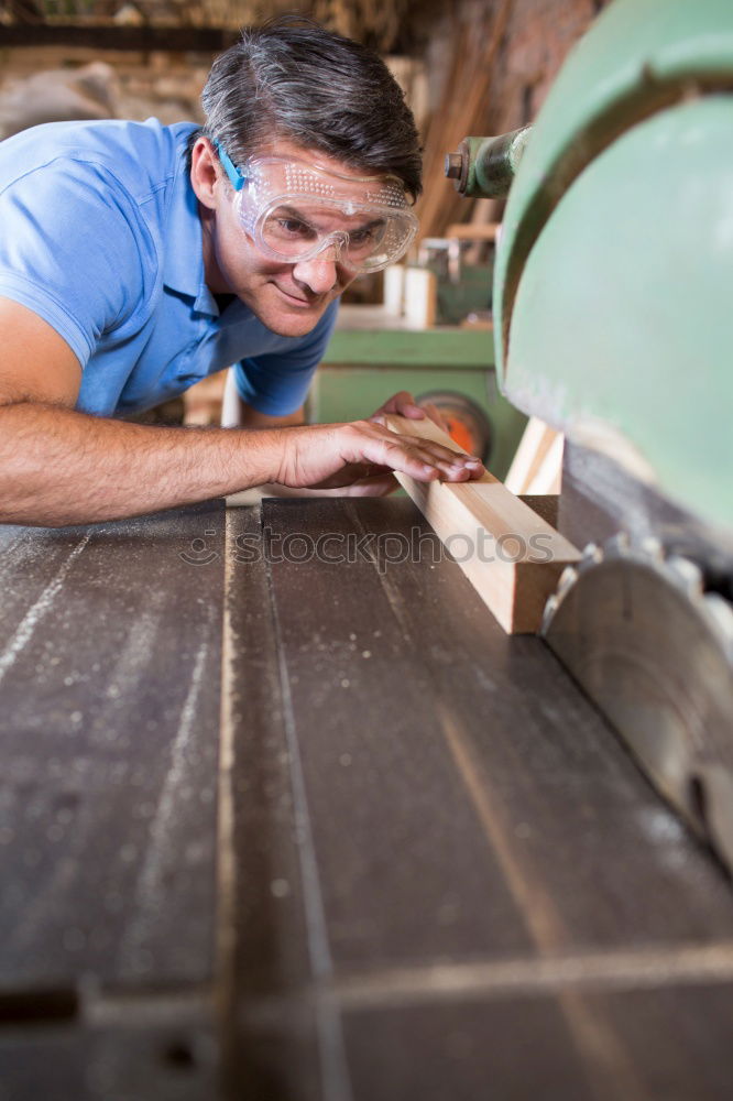 Similar – Professional carpenter at work.