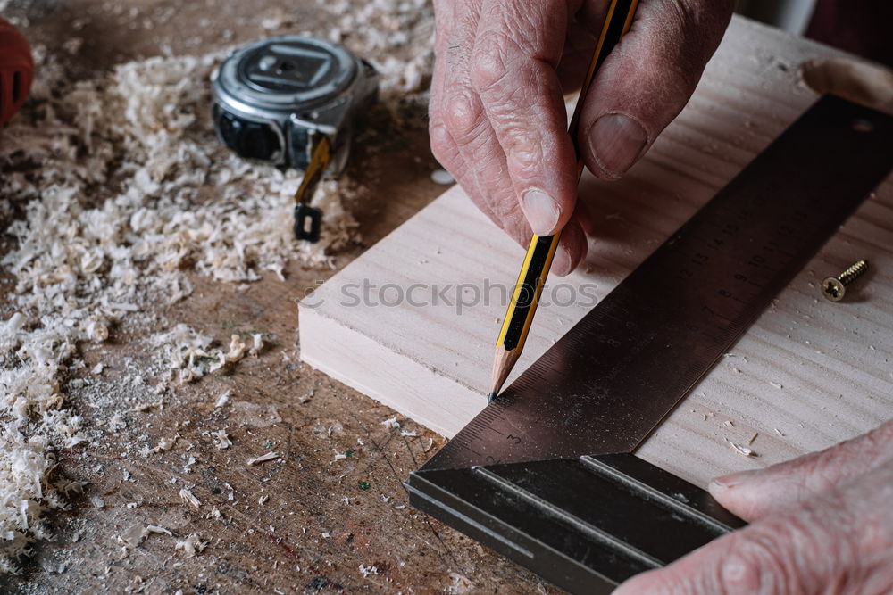 Similar – Craftsman working in his workshop wooden boxes