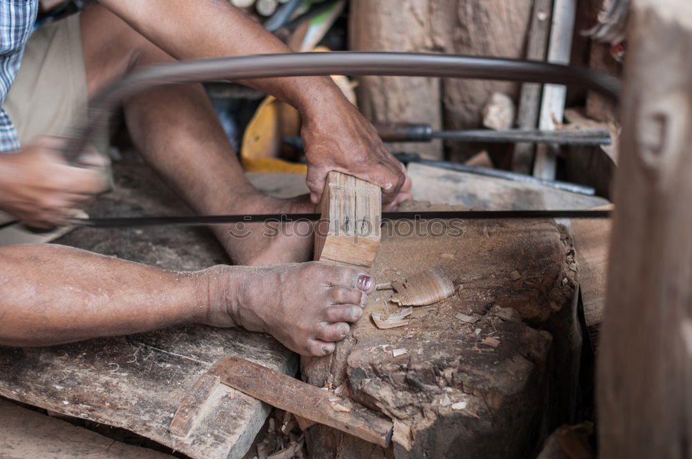 Similar – Image, Stock Photo Professional carpenter sanding and refinishing wood surface.