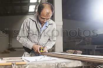 Similar – Professional carpenter at work.