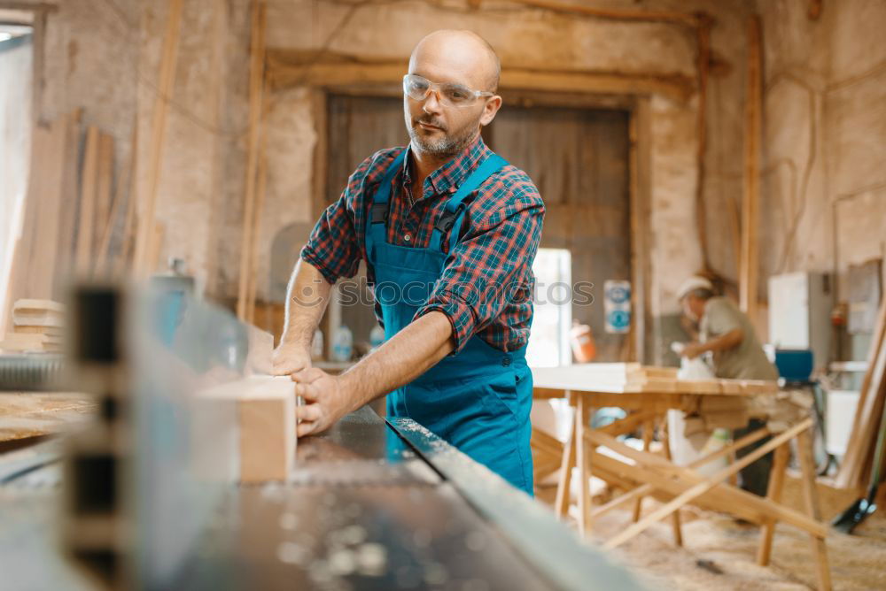 Similar – Portrait of senior carpenter.