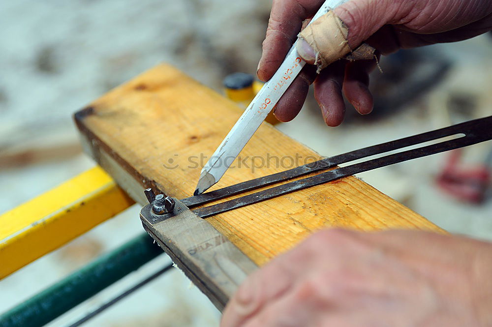 Similar – Carving stone, craftsman shaping stone