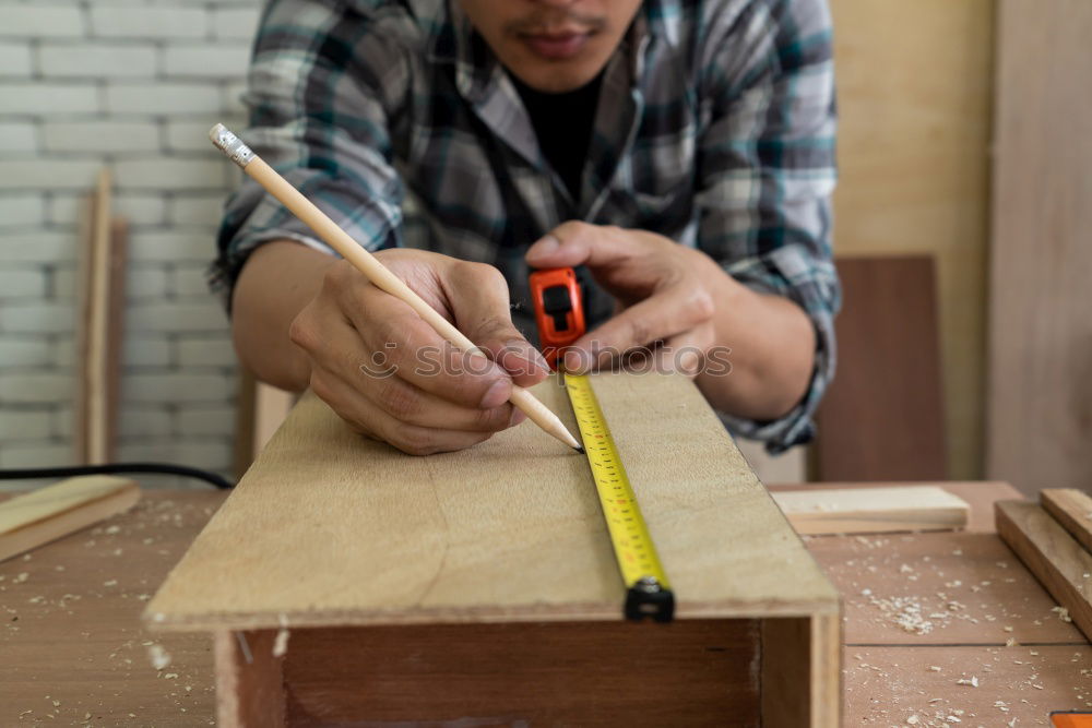 Similar – Image, Stock Photo Focused child polishing wood in workshop with unrecognizable grandfather