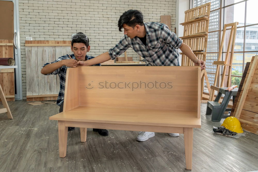 Similar – Image, Stock Photo Focused child polishing wood in workshop with unrecognizable grandfather