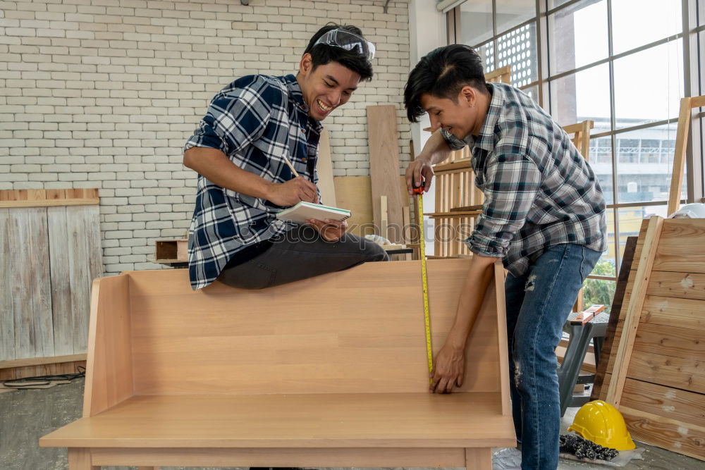 Similar – Image, Stock Photo Focused child polishing wood in workshop with unrecognizable grandfather