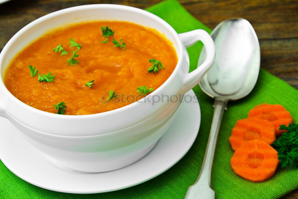 Similar – Fresh pumpkin soup in three bowls on a wooden table