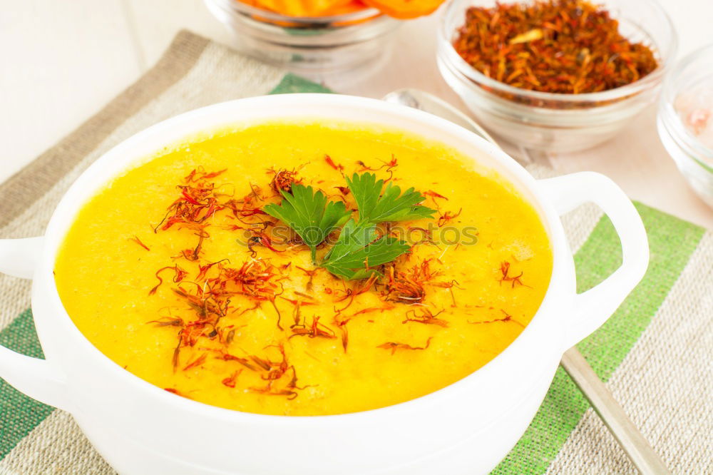 Similar – Fresh pumpkin soup in three bowls on a wooden table