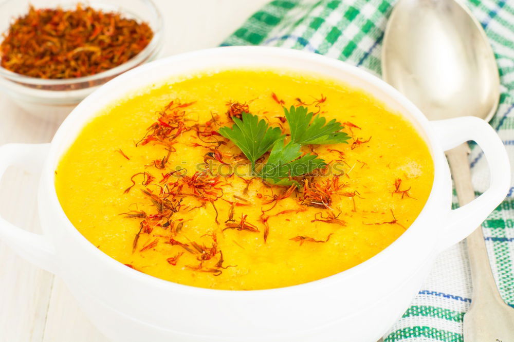 Similar – Fresh pumpkin soup in three bowls on a wooden table