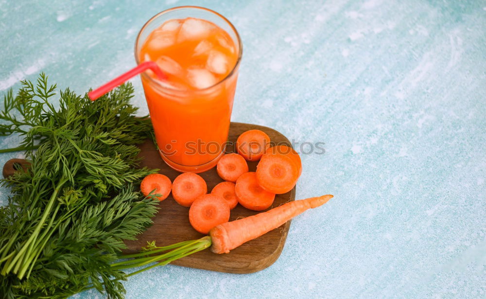 Similar – Fresh carrot juice with pulp among the vegetables