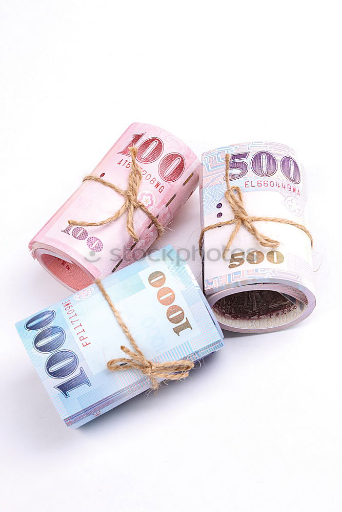 Similar – Image, Stock Photo Euro 50 value banknotes roll with rubber on gray background