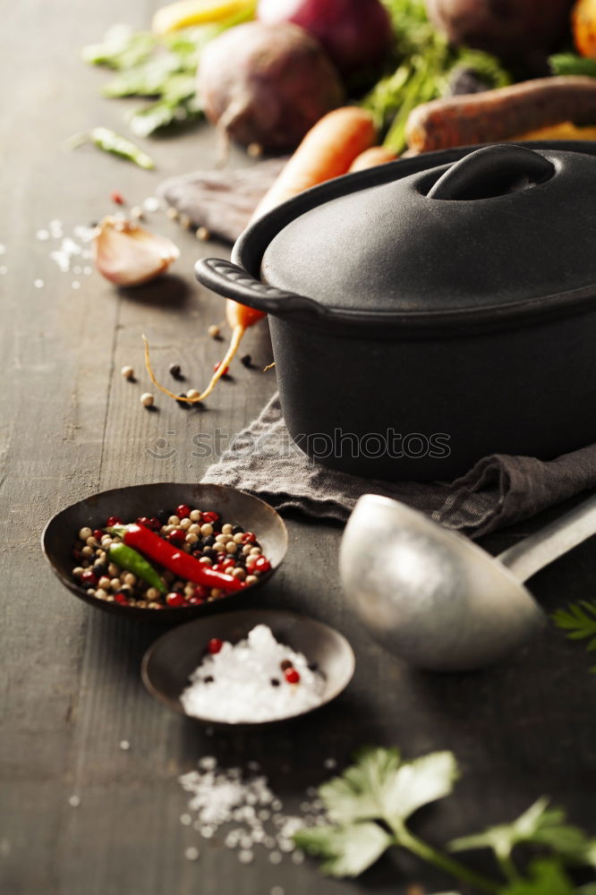 Similar – Image, Stock Photo Empty wok pan on kitchen table with chopsticks and vegetarian Asian food ingredients, top view. Copy space.  Healthy eating and cooking