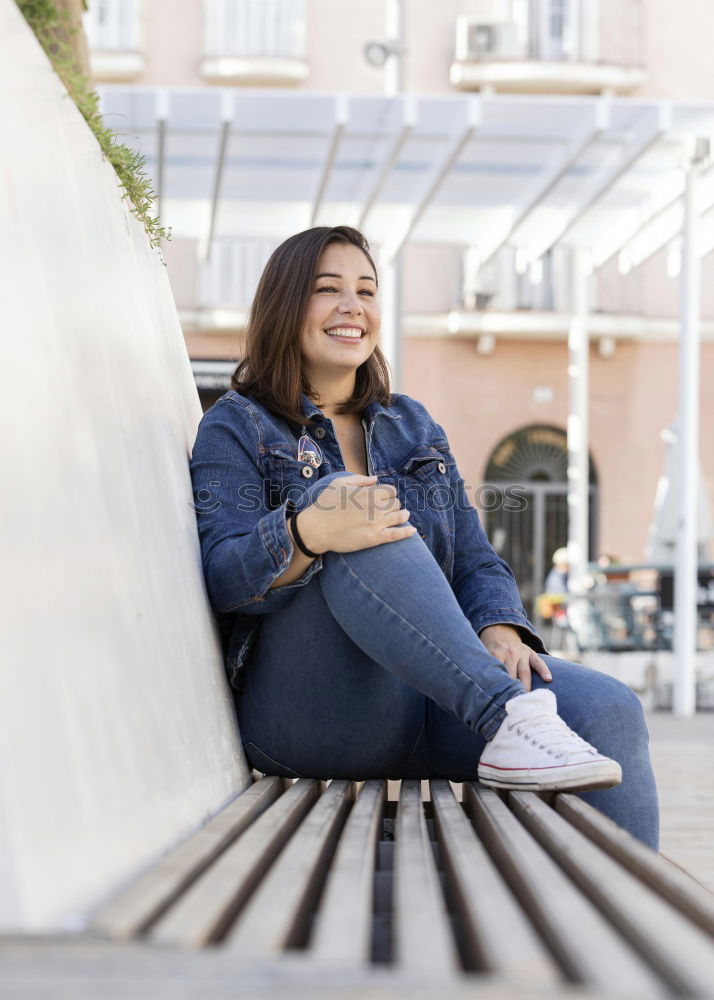 Similar – A young woman listening music on digital tablet