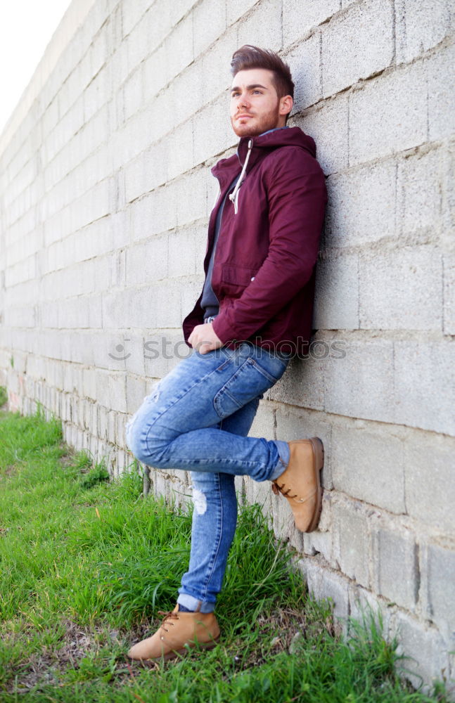 Similar – Young man in urban background wearing casual clothes