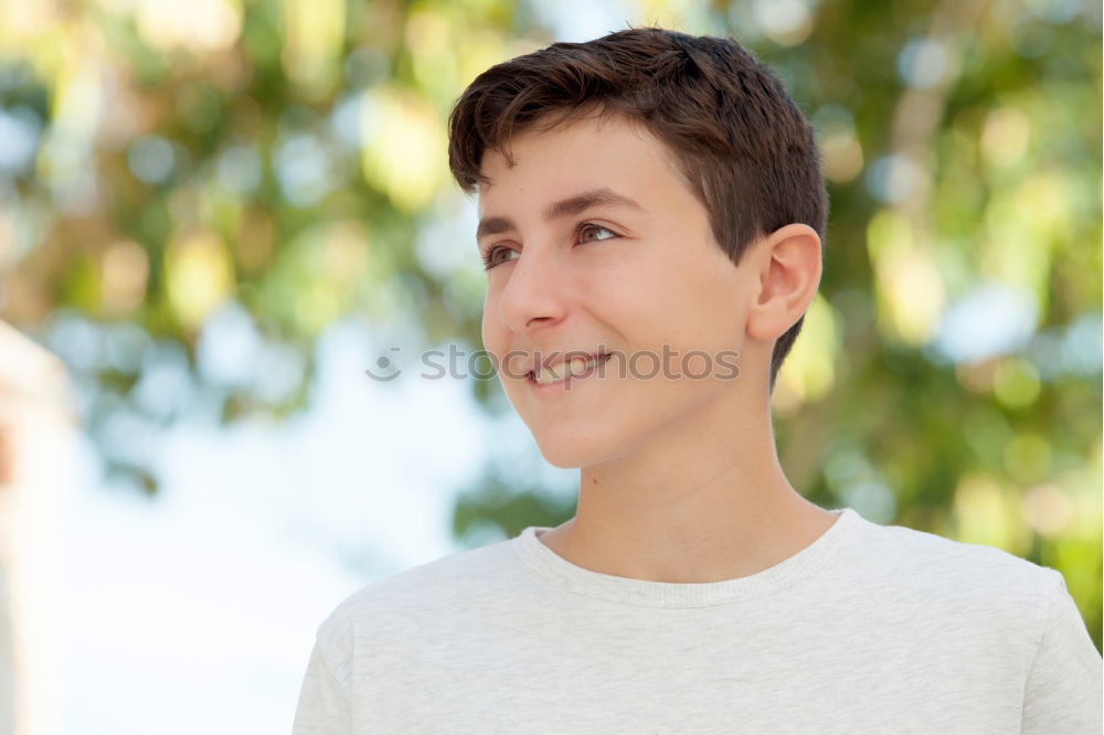 Similar – Image, Stock Photo Outdoor portrait of beautiful happy teenager guy