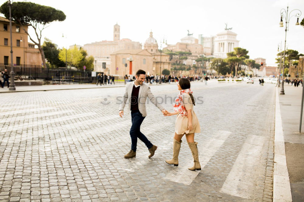 Similar – Boyfriend embracing his girlfriend in the street