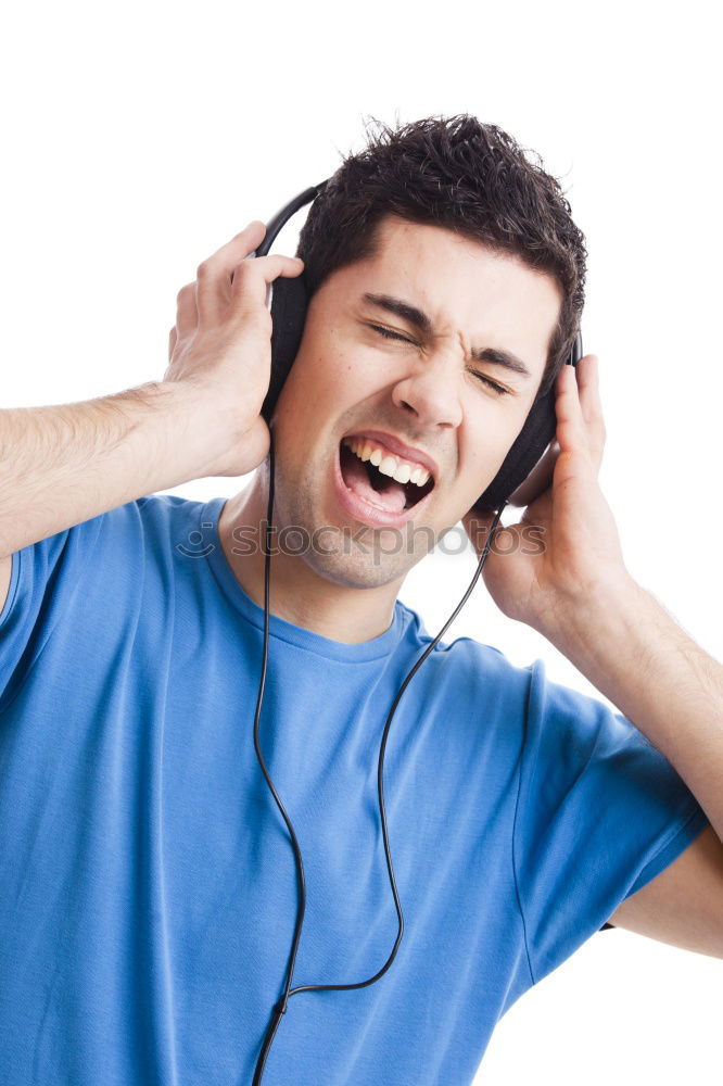 Similar – Black serious man listening to music in headphones